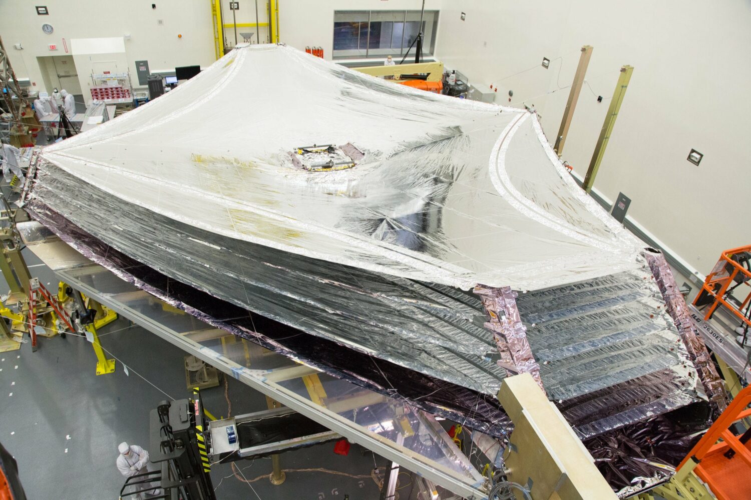 NASA’s James Webb telescope is unfurling a super-thin shield to save it from the sun