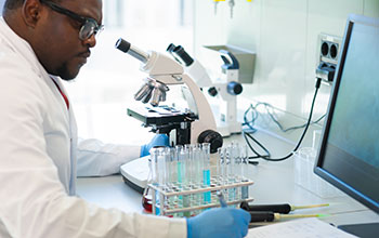 male scientist working in a lab