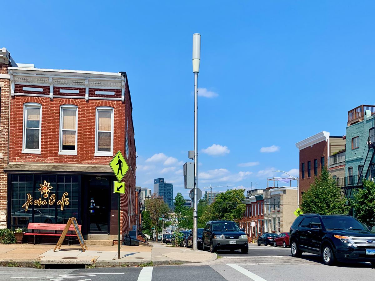 This small cell tower looks like a street lamppost in downtown baltimore, md.
