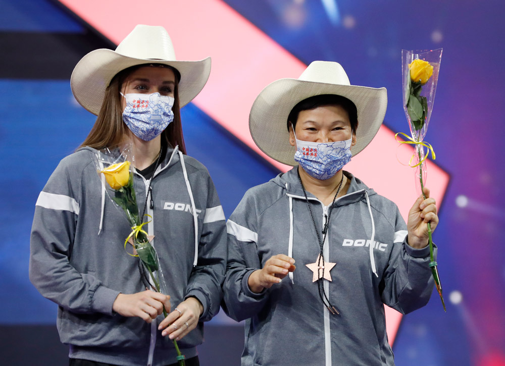 Sarah De Nutte (left) and Ni Xialian attend the award ceremony for the 2021 World Table Tennis Championships women’s doubles match in Houston, Nov. 29, 2021. Liu Guanguan/CNS/VCG
