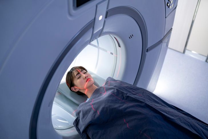 High angle view of patient lying in front of MRI scan