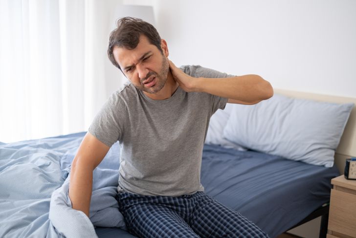 A man who wakes up and suffers from neck pain