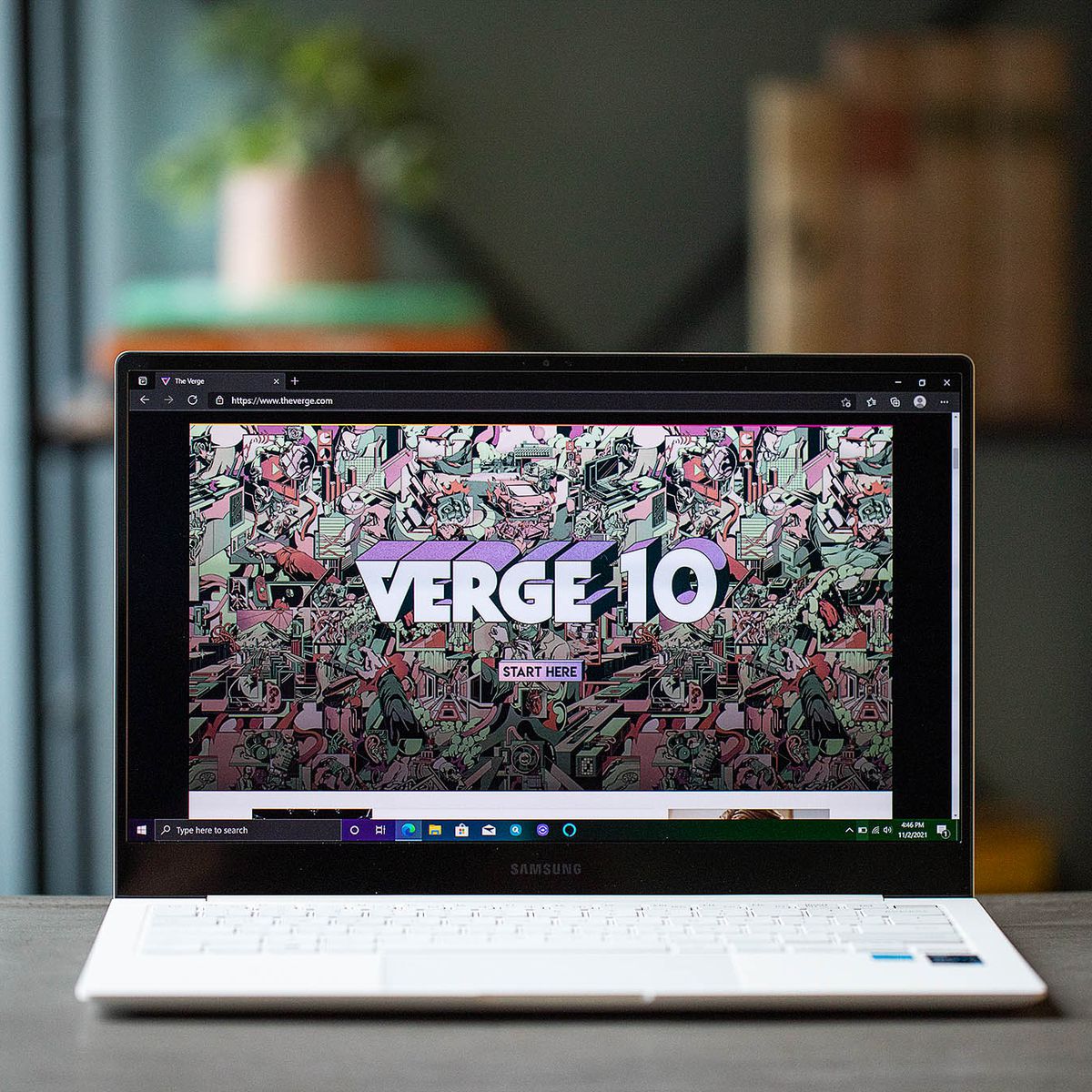 The Samsung Galaxy Book Pro opens and displays the Verge 10 image.