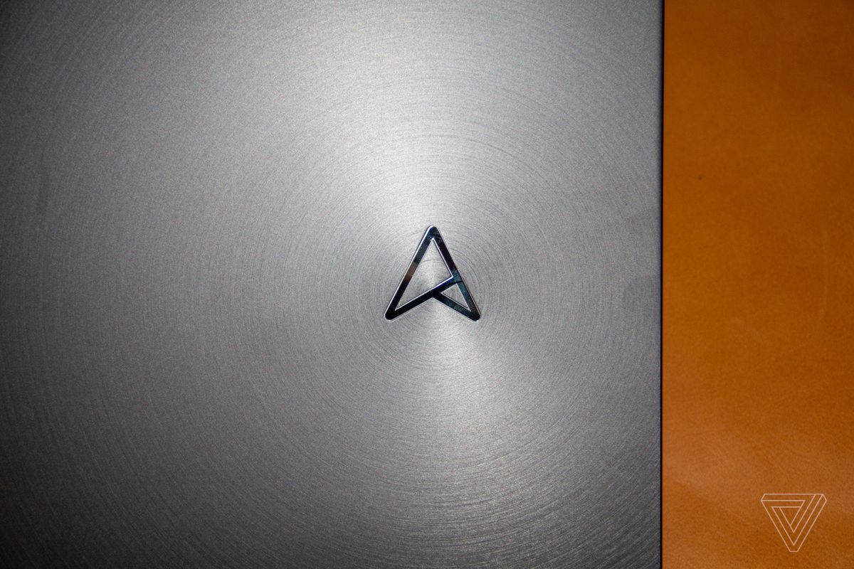 The logo on the lid of the Asus Zenbook Pro Duo 14 OLED seen from above.