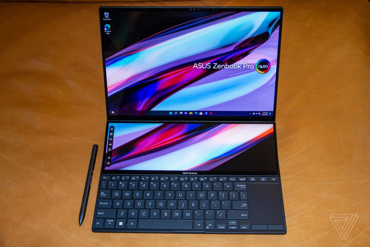 The Asus Zenbook Pro Duo 14 seen from above.  Both screens show a multicolored background.