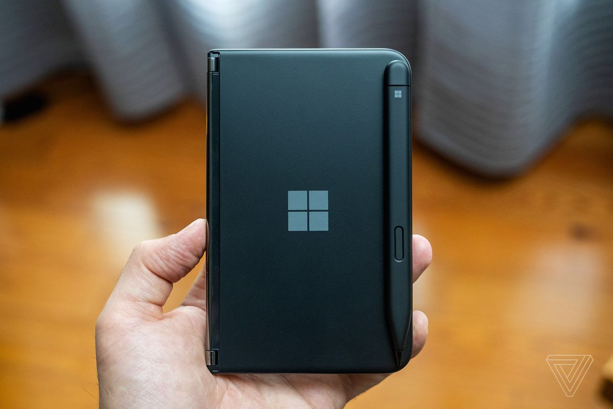 A black Surface Duo 2 with the Surface Pen's bumper cover attached.