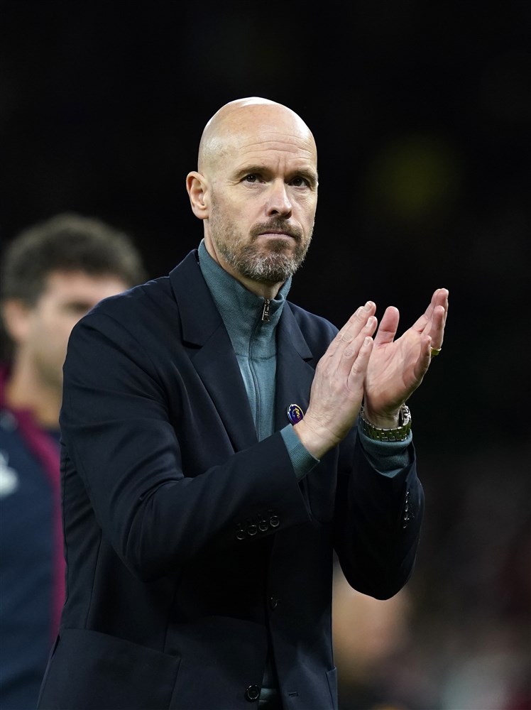 Manchester united manager erik ten hag claps after a game