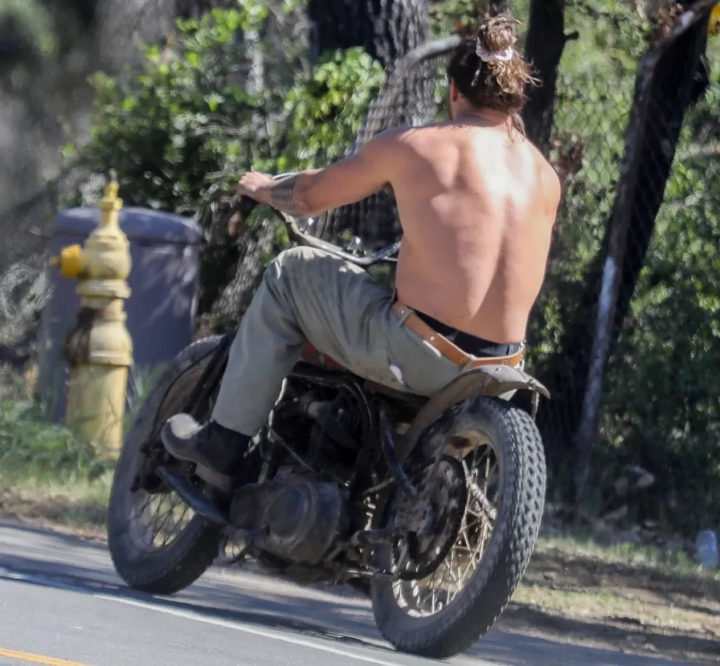 Jason momoa spotted on shirtless motorcycle ride ahead of oscars appearance