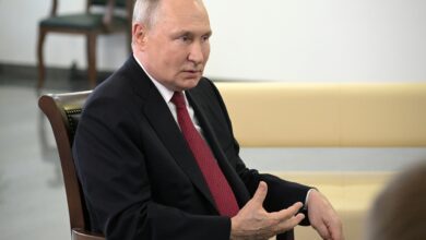 Russian president vladimir putin gestures 824590517